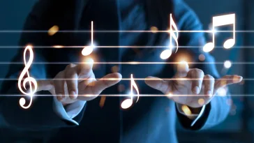 A evolução da indústria musical se desdobra em dois caminhos distintos: o modelo "LISTEN" e o "PLAY". Foto: Banco de Imagem